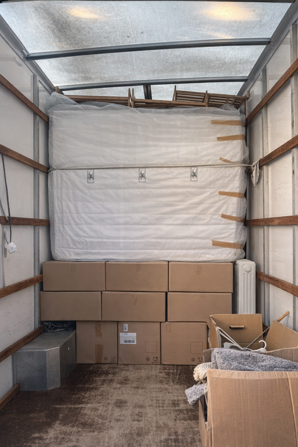 Furniture carefully packed in removals van