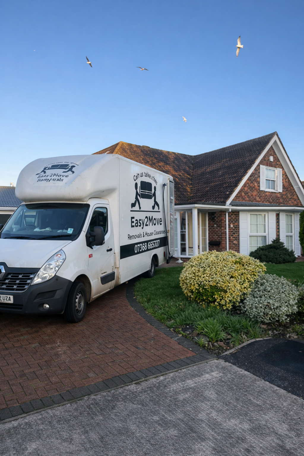 Removals service - van outside house